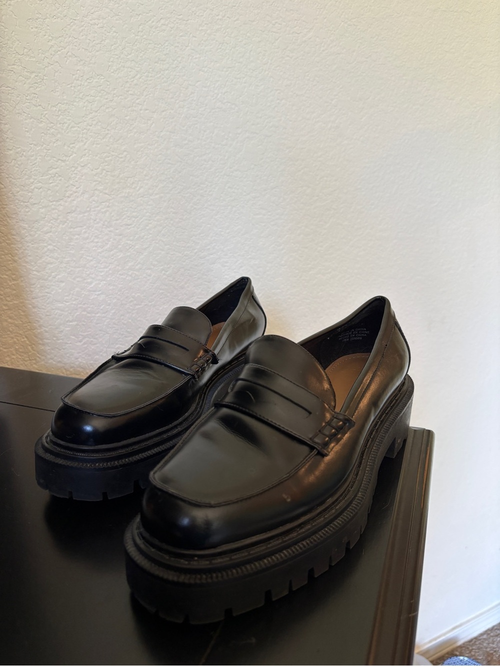 Black leather platform loafers